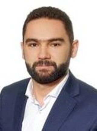 Zdjęcie przedstawiające dra Łukasza Klimkowskiego